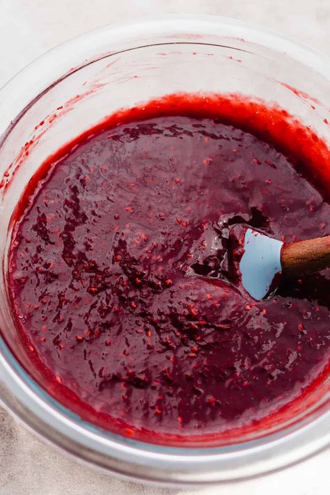 Raspberry Coulis comes together in 10 minutes with just 5 simple ingredients. This luscious raspberry dessert sauce is perfect for serving over ice cream, cheesecakes, or pound cake. Raspberry Glaze For Cheesecake, Raspberry Sauce For Cheesecake, Raspberry Coulis Recipe, Raspberry Drizzle, Coulis Recipe, Raspberry Dessert, Raspberry Desserts, Dessert Sauce, Raspberry Coulis