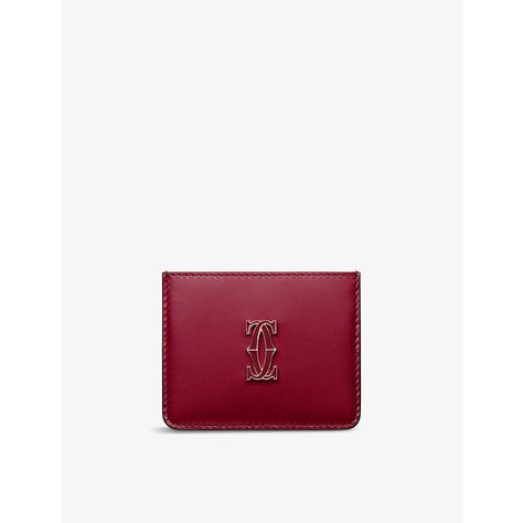 Find CARTIER C De Leather Card Holder on Editorialist. | Cartier leather card holder100% calfskin leatherOpen top, single inside compartment, three external card slots, gold-toned hardware, Cartier signature at sideHeight 7cm, width 10cmWipe with a clean, dry clothMade in Italy Leather Card Holder, Card Holder Leather, Cherry Red, Cartier, Card Slots, Calf Skin, Slots, Card Holder, In Italy