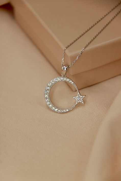 Silver Star and Crescent Necklace   ✔Handmade silver moon&star necklace and earrings ✔925 sterling silver ✔Preserves its shine for a long time ✔Ready for shipping Necklace  Material: 925 Sterling Silver Gemstone: Zircon Stone Width: 2.30 cm-0.90 in.100111 Height: 2 cm-0.78 in. Weight: 3.57 gr Earrings Material: 925 Sterling Silver Gemstone: Zircon Stone Width: 1 cm-0.39 in. Height: 0.80 cm-0.31 in. Weight: 1 gr You may choose it as a gift.🤍 If you have a question please don't hesitate to contact me.  YOU MAY USE THE EXPRESS SHIPPING OPTION TO GET YOUR ORDER FASTER. Express shipping send by UPS, TNT, and FedEx. Delivery time:  *Europe 2-4 business days, *USA- Canada 3-7 business days, *Everywhere else 5-10 business days. **Please share your phone number with me in case of cargo returns. Fe Moon Pendant Necklace Silver, Moon Star Necklace, Turkish Flag, Moon Necklace Silver, Islamic Jewelry, Pretty Jewelry Necklaces, Crescent Necklace, Symbol Necklace, Moon Pendant Necklace