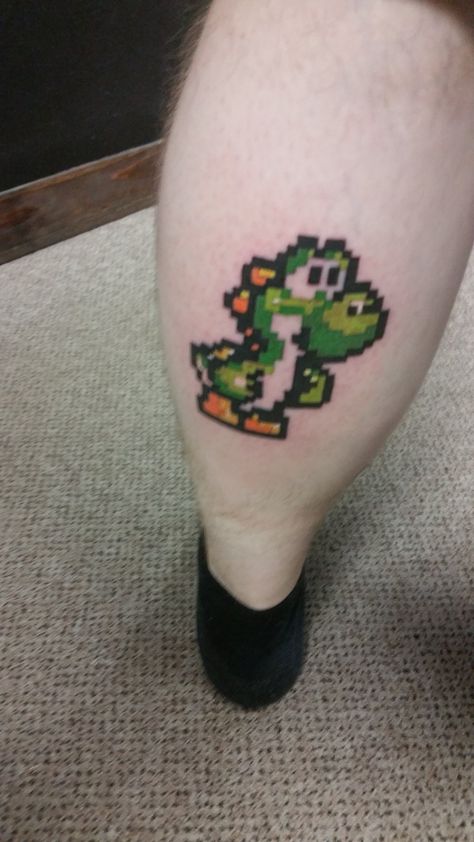 Yoshi Tattoo Design, Yoshi Tattoos, Owls Tattoo, Yoshi Tattoo, Yoshi Nintendo, Nintendo Tattoo, Cross Stitch Tattoo, Pixel Tattoo, Small Colorful Tattoos