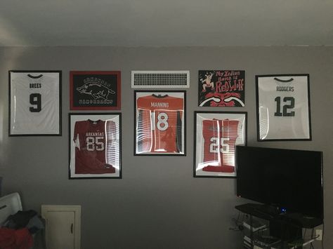 Sports Picture Wall Ideas, Framed Tshirt Wall Art, Framed Jerseys On Wall, Sports Memorabilia Room, Poster Frames, Framed Jersey, Boys Rooms, Sports Wall Art, Sports Wall