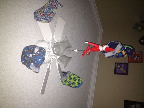 A fun Elf on the Shelf idea! Hang him from a ceiling fan with underwear (preferably your child's!) hanging all around. Funny Christmas Wrapping, Elf Trap, Elf On The Shelf Idea, Elf Of The Shelf, Christmas Elf Ideas, Elf Shelf, Puppy Toys, Awesome Elf On The Shelf Ideas, Elf On Shelf Ideas