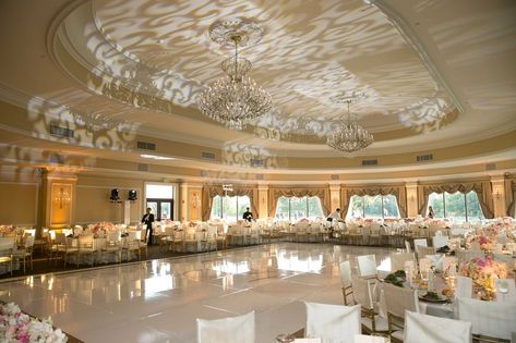 Classic wedding reception decorations with scroll pattern projection gobo on… Oheka Castle Interior, Fancy Ballroom, Wedding Reception Ballroom, Pink And Gold Color Palette, Make A Wedding Dress, Elegant Castle, Castle Reception, Oheka Castle Wedding, Corset Back Wedding Dress