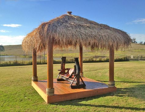 Instantly transform your backyard with a relaxing and waterproof thathed gazebo | Bali Thatch Hut With a Deck Bali Hut, Bali Huts, Garden Huts, Bali Garden, Rustic Pergola, Bamboo House Design, Farm Layout, Outdoor Steps, Backyard Gazebo