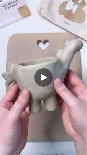 2.3M views · 267K reactions | How cute is this Dino planter! Such an easy way to elevate a pinch pot into something fun and full of character

Pottery wizard @chelseamorganart inspiring us again! 

#clay #pottery #diyclay #diycrafts #diyinspo #potteryinspo #handbuildingwithclay #dinoplanter #athomepottery #dinoplanter #cutediyprojects #crockd | Crockd | Men I Trust · Show Me How (Album V) Pinch Pot With Feet Ideas, Pinch Pot Ideas Ceramics Animals, Pinch Pot Ideas Ceramics, Clay Pinch Pots, Make A Dinosaur, Recycled Art Projects, Cute Diy Projects, Kids Clay, Pinch Pot