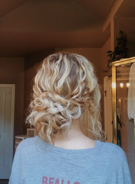 Wavy Low Bun Wedding, Curly Low Bun Hairstyles Prom, Loose Curly Bun Wedding, Messy Blonde Updo, Curly Bun Hairstyles Prom, Messy Bun Prom Hair, Hair Inspo For Curly Hair, Wavy Low Bun, Curly Low Bun Hairstyles