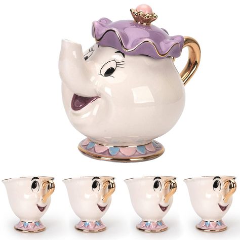 PRICES MAY VARY. Cartoon New Beauty and the Beast Teapot: This beautiful cartoon new Beauty and the Beast teapot has an exquisite and cute design, with a golden handle and cartoon characters of Mrs. Potts and Chip on the teapot. It's perfectly suited for tea lovers who love the classic Beauty and the Beast story. Mrs. Potts and Chip Teapot: The teapot is made of finest ceramic, which is long-lasting and easy to clean. It holds 500ml of water, which is enough for multiple cups of tea. The golden Beauty And The Beast Teapot, Fairytale Home Decor, Disney Princess Kitchen, Tea Cup Decor, Taylor Christmas, Disney Minimalist, Chip Mug, Beauty And Beast Wedding, Tea Party Set