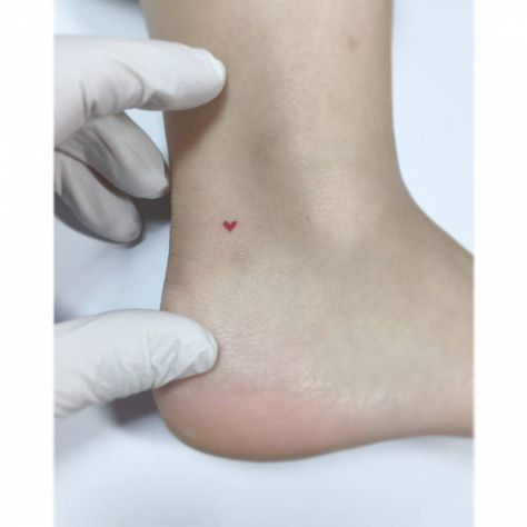 Micro red heart tattoo located on the ankle, Red Heart Tattoo, Heart Tattoo Ankle, Jonboy Tattoo, Love Heart Tattoo, Red Heart Tattoos, Tattoo Ankle, Tiny Heart Tattoos, M Tattoos, Ankle Tattoos For Women