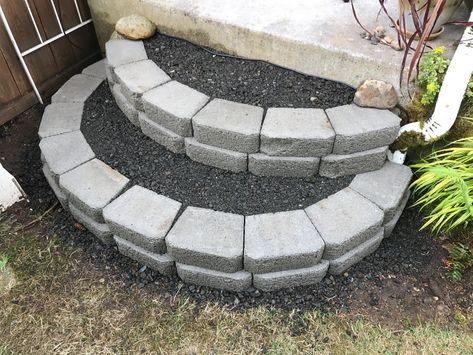 You can make these sturdy curved stairs out of concrete blocks and gravel for secure footing. This is a guide about how to make stacked block stairs. Cinder Block Stairs Outdoor, Landscape Blocks Ideas, Cinder Block Stairs, Concrete Block Steps, Cinder Block Steps, Trampoline Stairs, Block Stairs, Backyard Stairs, Backyard Steps