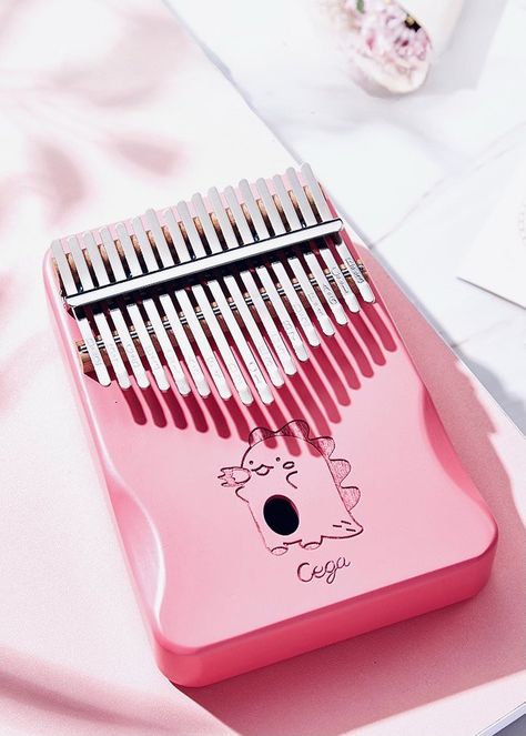 This "Cute Cartoon Pink 17-Key Kalimba" is an absolute delight! 🌸🎶 It's like a mini musical wonder that fits right in your hands. The pink hue and adorable cartoon design make it a perfect gift for anyone who loves music or simply enjoys cute things. Kalimba Drawing, Avatar Love Kalimba, Kalimba Anime Song, Anime Kalimba, 34 Key Kalimba, Adorable Cartoon, Cute Things, All Things Cute, Cartoon Design