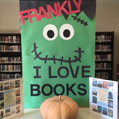 Halloween Book Bulletin Board, Fall In Love With Books Bulletin Board, Halloween Book Fair Ideas, School Library Halloween Decorations, Halloween Bulletin Boards Library, Frankenstein Bulletin Board, Frankenstein Bulletin Board Ideas, Book Return Box Ideas, Halloween Decorations Library