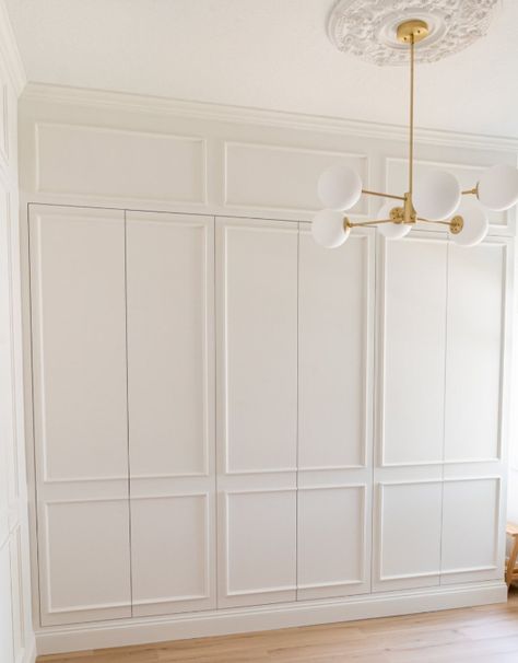 21 Gorgeous Ikea Pax Hacks (Updated 2024) Ikea Pax Studio Apartment, Full Wall Closet Door, Ikea Pax Fitted Wardrobe Hack, Pax Closet With Doors, Pax Mirror Doors, Ikea Pax Wardrobe Hack High Ceiling, Ikea Pax Entryway Closet, Pax Utility Room, Ikea Floor To Ceiling Cabinets