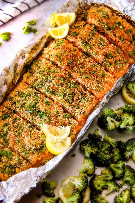 25 MINUTE Baked Lemon Garlic Butter Salmon with Crispy Parmesan Panko & Broccoli!  This salmon is not only bursting with flavor and sooo tender but the easiest, most satisfying meal that tastes totally gourmet!  My parents were blown away by this meal! Salmon Baked, Season Salmon Baked, Salmon Recipes Baked Lemon Garlic, Baked Salmon And Broccoli, Salmon With Bread Crumbs Oven Baked, Lemon Herb Salmon Baked, Eating Raw Garlic, Oven Baked Salmon Recipes, Salmon Fillet Recipes