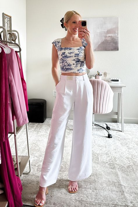 Here's how to style white linen pants for Summer! These wide leg tailored pants are lightweight and breathable, perfect for the warm Summer months! I paired them with this adorable cropped blue and white top from Abercrombie. For more ways to wear white linen pants, check out our latest post! Style White Linen Pants, Wide Leg Tailored Pants, Pants For Summer, Blue And White Top, Blue White Top, Blue Crop Top, White Linen Pants, Blue Crop Tops, Tailored Pants