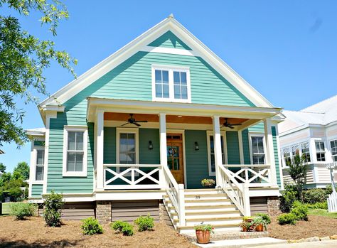 Adorable Turquoise Cottage at The Waters in Pike Road, AL Teal Cottage, Coastal Houses, Turquoise Cottage, Pretty Houses, Beach House Plans, Cottage Exterior, Pale Turquoise, Exterior Paint Colors For House, Small Houses