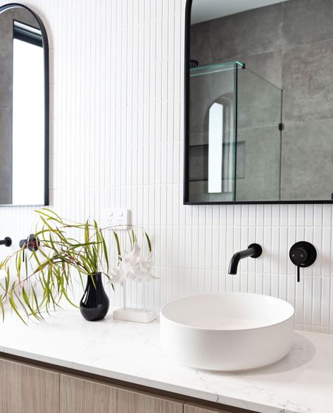 Pairing white kitkat tiles with sleek matte black tapware, this light-filled bathroom exudes a stunning minimalist charm 🖤⁠ 📸: @cookandbathe⁠ ⁠ ⁠ #bathroom #bathroomdesign #interiordesign #design #interior #home #homedecor #bathroomdecor #shower #bath #renovation #homedesign #bathroomremodel #bathroominspo #bathroominspiration #bathroomrenovation #tiles #toilet #renovationideas #luxury #marble #bathroomgoals #bathroomideas #houseinspo #designinspo #renovationinspo #housedesign #bathroomreno #... White Kitkat Tiles, Kitkat Tiles, Tiles Toilet, Black Tapware, Bathroom Color Schemes, Bath Renovation, Apartment Living Room Design, Luxury Marble, Bathroom Goals