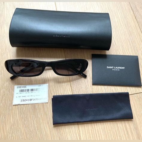 SL 557 SAINT LAURENT shade/sunglasses black YSL Ysl 557 Sunglasses, Narrow Sunglasses, Shade Sunglasses, Ysl Sunglasses, Saint Laurent Accessories, Saint Laurent Sunglasses, Shades Sunglasses, Hailey Bieber, Sunnies