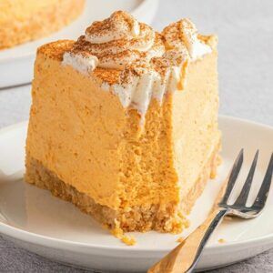 No Bake Pumpkin Cheesecake {Keto!} - The Big Man's World ® Keto Pumpkin Cheesecake, Low Carb Pumpkin Cheesecake, No Bake Pumpkin, No Bake Pumpkin Cheesecake, Dairy Free Cream Cheese, Pumpkin Pie Cheesecake, Pumpkin Cheesecake Recipes, Desserts Keto, Pie Cheesecake