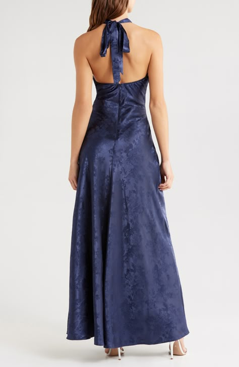 Romantic jacquard flowers enrich an event-ready satin gown fashioned with a crossover halter neck and flowy A-line skirt. Ties at back; hidden back-zip closure Halter neck Lined 97% polyester, 3% spandex Hand wash, line dry Imported Navy Dress Maxi, Satin Dresses Wedding Guest, Navy Blue Dresses Long, Dark Blue Floor Length Dress, 70s Halter Dress, Halterneck Prom Dress, Halter Neck Prom Dresses, Labor Day Wedding Guest Dress, Dark Colored Prom Dresses