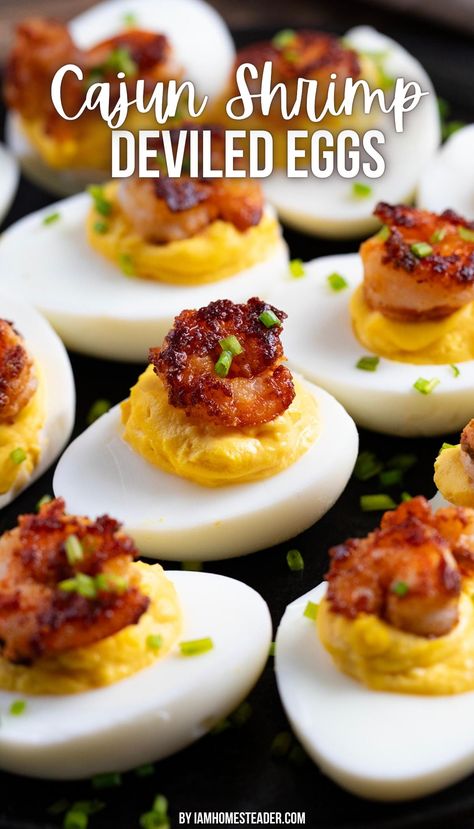 A plate filled with cajun shrimp deviled eggs. Shrimp Deviled Eggs Recipes, Cajun Shrimp Deviled Eggs, Hot Honey Shrimp Deviled Eggs, Southern Easter Dinner Ideas, Egg Flight Ideas, Seafood Deviled Eggs, Cajun Deviled Eggs Recipe, Deviled Eggs Ideas, Fried Deviled Eggs Recipe