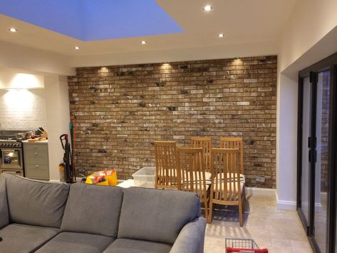 Brick slip internal wall Brick Slip Feature Wall, Exposed Brick Wall Fireplace, Brick Slip Media Wall, Brick Slips Living Rooms, Internal Brick Wall Ideas, Internal Brick Wall, Brick Wall Dining Room Ideas, Brick Slip Wall, Brick Feature Wall Living Room