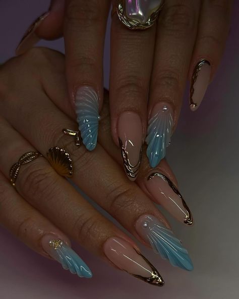 Mermaidcore has held sway as one of the biggest trends of the season, and with it came seashell nail art! From nautical elegance to edgy vibes, our roundup of seashell designs has something for everyone. Dive into these unique ideas and tap “Beauty” link in bio to see more trending nail designs! 🐚 Pick your vibe 💅 — Click link in Bio to see the latest Fashion Trends, Celebrity Style, and more! Subscribe to Style Rave Premium & Shop Editor-selected Pieces 🛍 — #StyleRave: The ultimate style ... Pirate Nails Design, Pirate Nails, Seashell Nails, Edgy Vibes, Nautical Nails, Ongles Nails, Nail Forms, Pretty Acrylic Nails, Nail Games