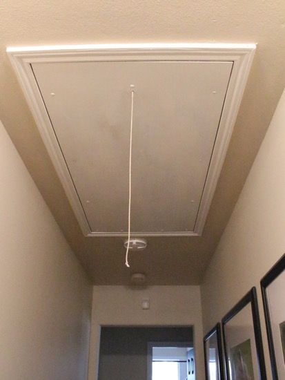 Get rid of that ugly cord hanging from your attic stairs Diy Stairs To Attic, Attic Entrance Ideas, Attic Hatch Ideas, Pull Down Stairs To Attic, Garage Attic Door, Attic Steps Pull Down, Pull Down Attic Stairs Ideas, Attic Drop Down Stairs, Attic Diy Ideas