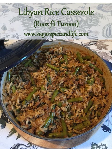 Libyan Rice Casserole (Rooz fil Furoon) - A delicious rice dish baked with a spicy tomato sauce, vegetables and ground beef. #libyan #northafrican #casserole #rice Libyan Food Recipes, Lebanese Rice With Ground Beef, Lebanese Rice With Meat, Liberian Rice Bread Recipe, Liberian Jollof Rice, Pilau Rice Recipe Tanzania, Libyan Food, Around The World Food, Middle Eastern Dishes