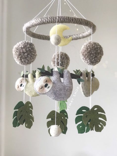 Excited to share the latest addition to my #etsy shop: Sloth mobile , sloth nursery, mobile sloth ,tropical mobile, nursery boho mobile ,felt sloth mobile . #housewares #homedecor #bohomobile #mobilenursery #slothgifts #slothornament Sloth Nursery Ideas, Felt Sloth, Sloth Nursery, Boho Mobile, Nursery Boho, Mobile Hanging, Baby Mobil, Fun Nursery, Diy Bebe