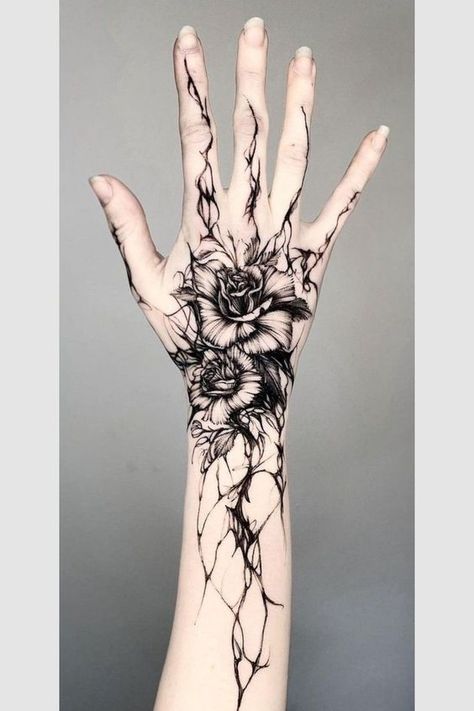 Black Flower Hand Tattoo, Dark Tattoos With Meaning, Hand Tattoos Wolf, Music Hand Tattoo, Moth Tattoo Hand, Full Hand Tattoo Design, Creepy Hand Tattoos, Hand Tattoos Drawing, Raven Tattoo Feminine Arm