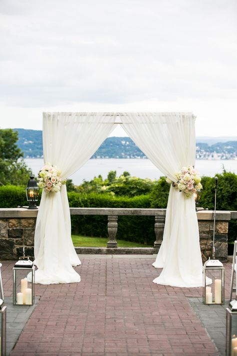 White Fabric Chuppah With Blush Arrangements | Sara Wight Photography https://www.theknot.com/marketplace/sara-wight-photography-brooklyn-ny-239955