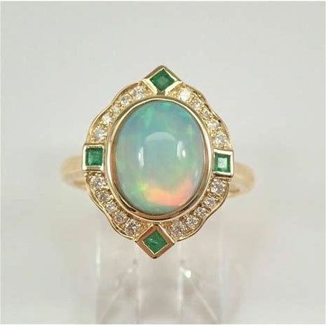 Emerald Cut opal Engagement Ring - Bing - Shopping Halo Engagement Ring Emerald, Emerald Halo, Opal Ring Gold, Engagement Ring Sizes, Natural Opal, Halo Engagement Ring, Brilliant Diamond, Halo Engagement, Opal Rings