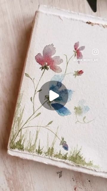 Emma Weekes | Watercolour teacher and Sketchbook maker on Instagram: "How to: Loose watercolour 3 petal flowers

1. Add lots of water to a little bit of watercolour paint. You want it to be a pale shade. 

2. With this watery paint, paint 3 simple petal shapes like in the video. 

3. Put some less watery paint on to the tip of your brush. You want this paint on your brush to be stronger in colour, and to do this you need less water mixed in with the paint pigment. 

4. Tap the tip of your brush at the bottom of your petals. You’ll see the colour spread into the watery petals you’ve already painted like magic. This will look so beautiful when it’s dried! 

5. Repeat! Experiment with different colours if you want to. 

6. Add some thin curved stems. Use stems to connect your flowers together Watercolour Mixing, Watercolour Sketchbook, Loose Watercolour, Water Mixes, Watercolour Paint, Paint Paint, Loose Watercolor, Watercolour Tutorials, Watercolour Painting