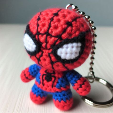 Crochet Spider Hero Keychain Free Crochet Spiderman Patterns, Spiderman Crochet Keychain, Spiderman Amigurumi Pattern Free, Crochet Spiderman Free Pattern, Crochet Spiderman Keychain, Crochet Spider Pattern Free, Crochet Keychain For Boys, Spiderman Crochet Pattern Free, Spider Man Crochet