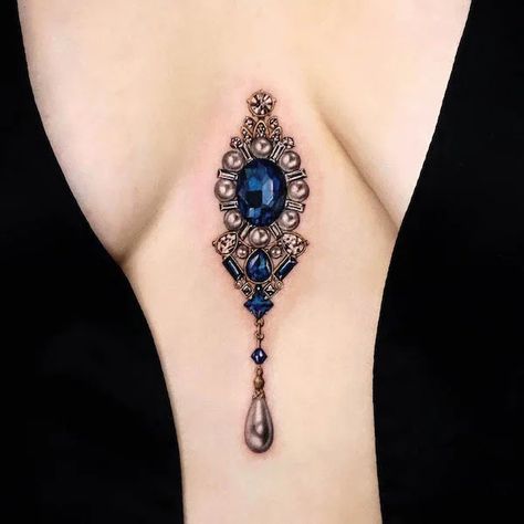 Jeweled Shoulder Tattoo, Sternum Gem Tattoo, Yeriel Tattoo, Jewel Tattoo Gem, Jewel Chest Tattoo, Gemstone Tattoo, Pendant Tattoo, Gold Tattoo Ink, Chandelier Tattoo