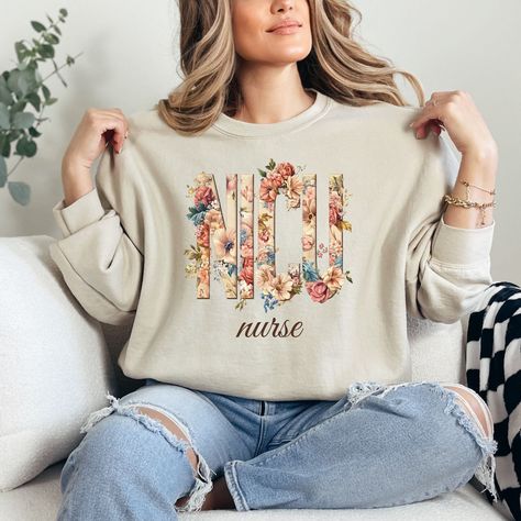 Nurse Sweatshirt,Nicu Sweatshirt,Nicu Sweater,Nurse Sweater,Gift For Nurse,Rn Sweatshirt,Christmas Gift For Nurse,Floral Nicu Sweatshirt by PrintHarmonyHub on Etsy Nurse Sweater, Nurse Appreciation Week, Christmas Gifts For Nurses, Nurse Sweatshirt, Gift For Nurse, Nursing Student, Medical Field, Sweater Gift, Registered Nurse