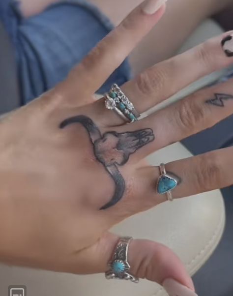 Bull Tattoo On Hand, Tattoos That Fit Together, Longhorn Tattoo On Hand, Longhorn Finger Tattoo, Long Horn Hand Tattoo, Bull Skull Finger Tattoo, Cow Finger Tattoo, Cow Skull Finger Tattoo, Western Tattoos On Hand