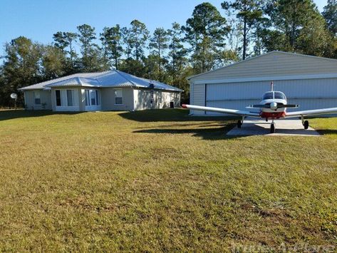 Looking for a plane AND a place to land that plane? Look no further. Featured today is a fully furnished Florida airpark home with a hangar AND a plane! Built in 2009, the home is on 1 acre of land and sits mid-strip on the 2500’ paved runway, which you will use frequently flying the INCLUDED 1974 Piper Cherokee 140. Available for $399,000.00 USD, explore the complete listing online at www.Trade-A-Plane.com. Airpark Homes, Piper Cherokee, General Aviation, Dream Design, A Plane, Florida Home, My Dream Home, Estate Sale, Home And Family