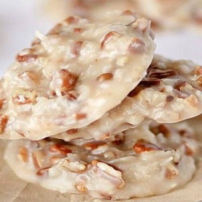 Pecan Coconut Praline Cookies (No Bake) @keyingredient *#nobake2½	cups sugar ½	cup evaporated milk ½	cup corn syrup ½	cup butter 1	teaspoon vanilla 2-2½	cups chopped pecans 2½	cups grated coconut Praline Cookies Recipe, Pecan Praline Cookies, Praline Cookies, Pecan Praline, Louisiana Cajun, Cajun Cooking, Coconut Pecan, Pecan Pralines, Baking Recipes Cookies