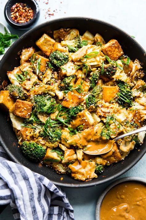 Creamy, garlicky, gingery homemade peanut sauce makes this super healthy tofu and vegetable stir-fry into a hearty, satisfying vegan dinner even omnivores will love. Sauce For Tofu, Homemade Peanut Sauce, Tofu Stir Fry, Vegan Mushroom, Mushroom Pasta, Giada De Laurentiis, Vegan Comfort Food, Fried Vegetables, Vegetable Stir Fry