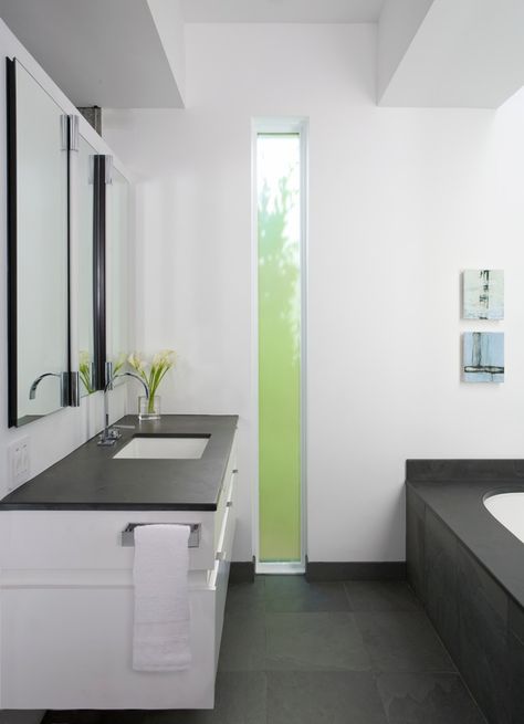 Contemporary Full Bathroom with Flush, Corian Deep Nocturne Solid Surface, Undermount sink, Slate counters, European Cabinets Vertical Windows, Slate Countertop, Lisbon Apartment, Simple Bathroom Remodel, Window In Shower, Home Design Magazines, Bathroom Window, Diy Bathroom Remodel, Bathroom Windows