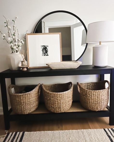 Natural Decor With Black Accents, Mantle Decor Organic Modern, Decorating Small Tables Ideas, Black Entryway Table Decor With Mirror, Black White And Wicker Living Room, Black And Tan Entryway, Black And Cream Entryway, Black And Cream Home Decor, Fish Bowl Decor Ideas