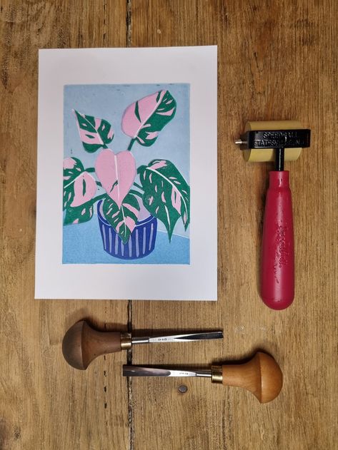 'Pink House Plant'' print.

This print is a bright bold image of the much loved house plant Philodendron Pink Princess. It is a multi layer reduction print. The the original, unique image was carved in lino and then hand printed in a variety of bright colours to create the vibrant result.

This is an original lino print that I hand carved and then hand printed to make this unique print.

It is printed in onto A5 size (15x21cm) high quality, silk finish, 120gsm white paper.

The print will be sent to you in appropriate packaging to ensure safe delivery.

This print is individually hand-printed, it may contain unique imperfections, as is the nature and charm of hand-printing. Reduction Print, Philodendron Pink Princess, Pink House, Hand Of Cards, Pink Houses, Plant Print, Unique Image, House Plant, Lino Print