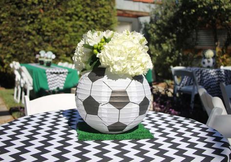 GOAL! Greyson's Soccer Birthday | CatchMyParty.com Soccer Paper Lantern Centerpieces, Soccer Birthday Table Decor, Simple Soccer Party Decorations, Soccer Lantern Centerpiece, Soccer Theme Party For Adults, Soccer Birthday Centerpieces, Soccer Banquet Ideas Table Decorations, Soccer Party Centerpiece Ideas, Soccer Party Table Decor