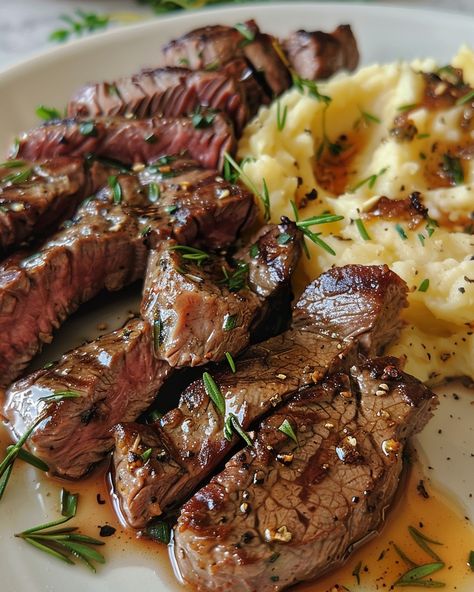 GARLIC BUTTER STEAK BITES AND MASH 🥩🧈 Ingredients: 1 lb sirloin steak, cut into bite-sized pieces Salt and pepper, to taste 2 tbsp olive oil 4 tbsp unsalted butter 4 cloves garlic, minced 1 tbsp fresh parsley, chopped Mashed Potatoes: 4 large potatoes, peeled and cubed 1/2 cup milk 4 tbsp unsalted butter Salt and pepper, to taste Directions: Step 1: Prepare the Mashed Potatoes Place the cubed potatoes in a large pot and cover with water. Add a pinch of salt and br... Lamb Chops And Potatoes, Steak With Mashed Potatoes, Steak Sirloin, Steak And Mashed Potatoes, Garlic Butter Steak Bites, Butter Steak Bites, Mash Potato, Steak And Potatoes, Butter Steak