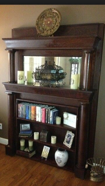 Fireplace mantle converted to bookshelf Old Fireplace Mantle Ideas, Repurposed Mantle Ideas, Antique Fireplace Surround Ideas, Old Fireplace Mantle Repurpose, Old Mantle Repurpose, Repurposed Fireplace Mantle, Antique Fireplace Mantle Ideas, Antique Mantel Decorating Ideas, Vintage Fireplace Mantle Decor