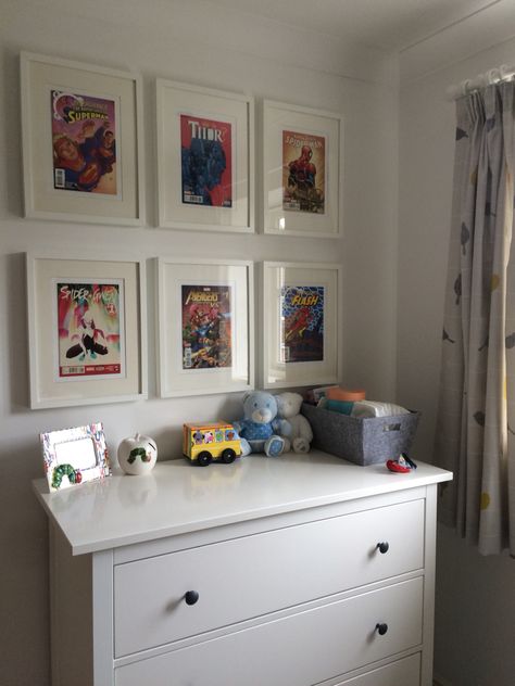 Finally put up these pictures in the nursery. I framed comics from this year to add some colour and fun. They'll also hopefully be a nice keepsake for my baby one day from the year they were born. #diy #frame #picture #wall #nursery #comic #neutral Picture Wall Nursery, Comic Book Nursery, Frame Picture Wall, Marvel Nursery, Comic Display, Book Nursery, Frame Picture, Neutral Nursery, Big Boy Room