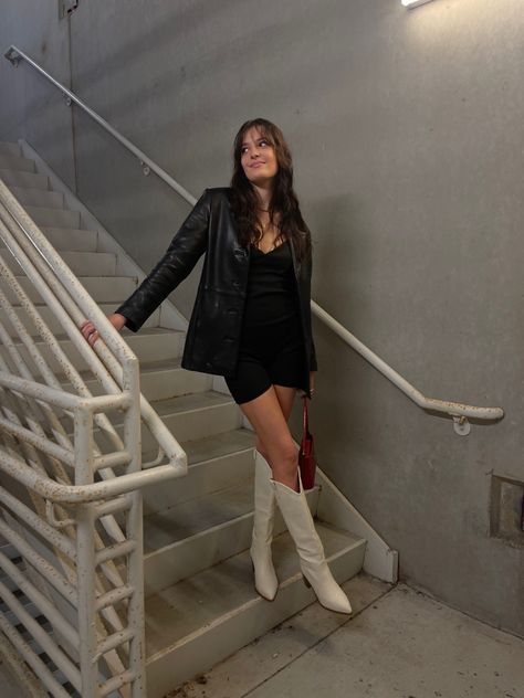 Cowgirl Black Dress Outfit, Cowboy Boots Night Out Outfit, White Boots Black Outfit, White Boots Night Outfit, Dresses With Cowboy Boots Fall, Western Boots Dress Outfit, Style White Cowgirl Boots, Mini Dress With Cowgirl Boots, Thigh High Cowgirl Boots Outfit