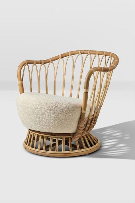 Shop suiteny.com for the Grace Chair by Tove Kindt-Larsen. The flexibility of rattan—its ability to be bent and shaped at will—is at the heart of Tove Kindt-Larsen’s vision for the Grace Chair, whose rattan frame is entirely crafted by hand. The result is a daring balance of elegance and informality, resulting in a piece that will make a bold statement as it casts playful shadows across any interior space, while welcoming those who regularly curl up inside it like an old friend. Rattan Aesthetic, Bamboo Chair Design, Rattan Chair Living Room, On Suite, Furniture Rattan, Rattan Chairs, Furniture Design Chair, Cane Furniture, Bamboo Chair