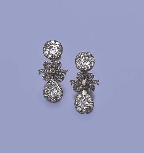 A PAIR OF ATTRACTIVE LATE 18TH CENTURY DIAMOND EARRINGS   Each designed as an old-cut diamond cluster drop to a ribbon bow and circular cluster detachable top, mounted in silver and gold, circa 1780, in later fitted case Rococo Jewelry 18th Century, Georgian Jewelry 18th Century, Jewelry 18th Century, 18th Century Jewelry, Jessica Mccormack, Diamond Fashion Jewelry, Georgian Jewelry, Royal Jewels, Jewelry Design Necklace